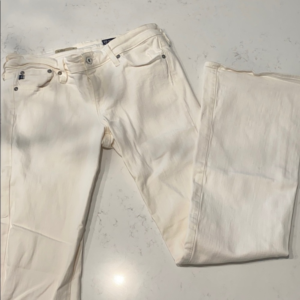 Cream flare jeans